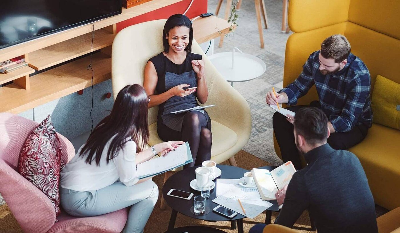 Business team in office discussing secure email solution and encryption options