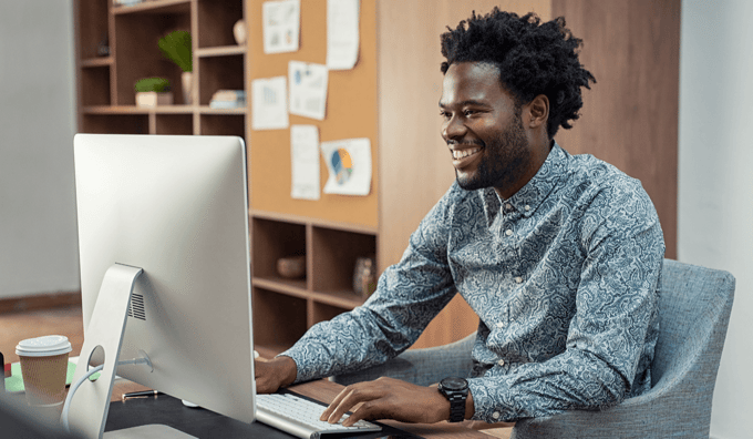 financial adviser encrypting email using desktop computer