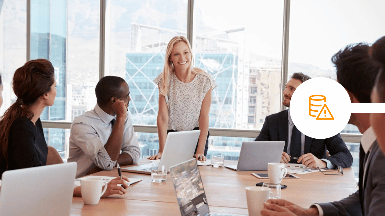 Board discussing cybersecurity at board room table
