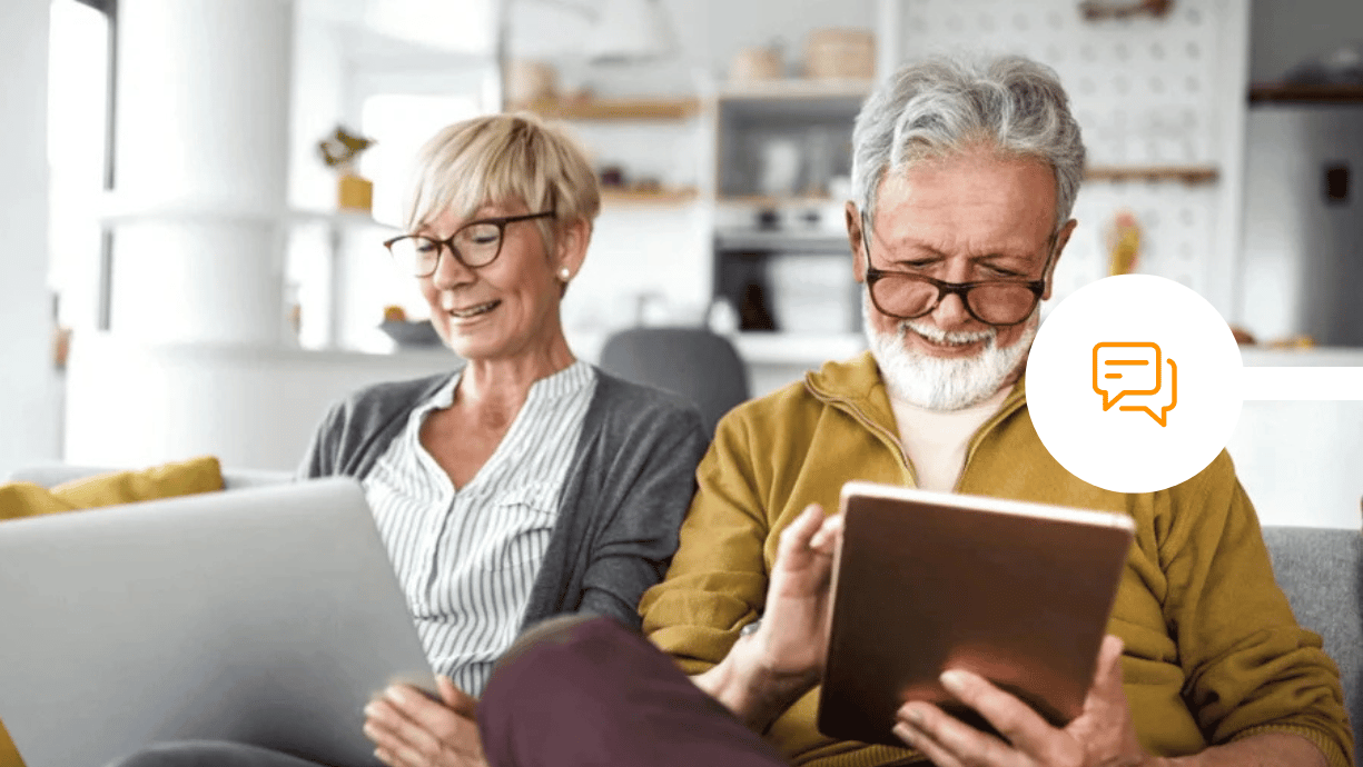 Couple reviewing their finances together on digital devices