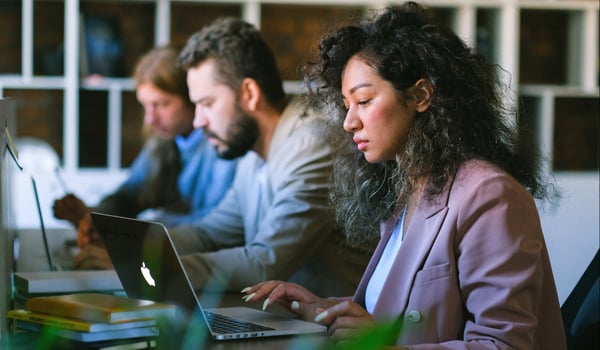 Professionals working in office with email security