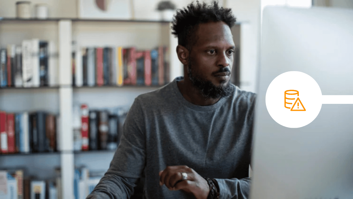 Man working with confidential information on a mac