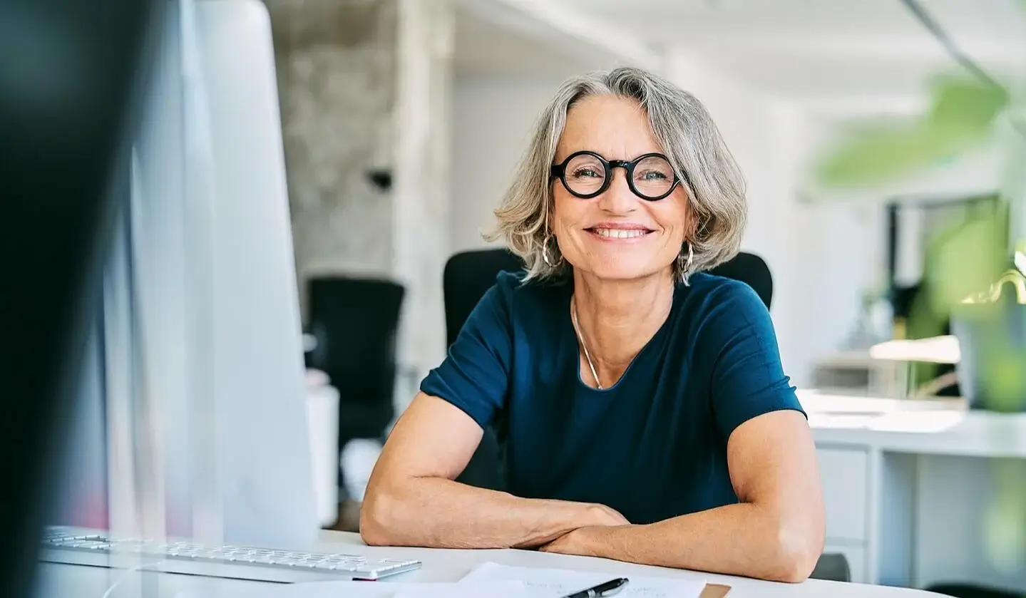 Sustainability officer smiling in office