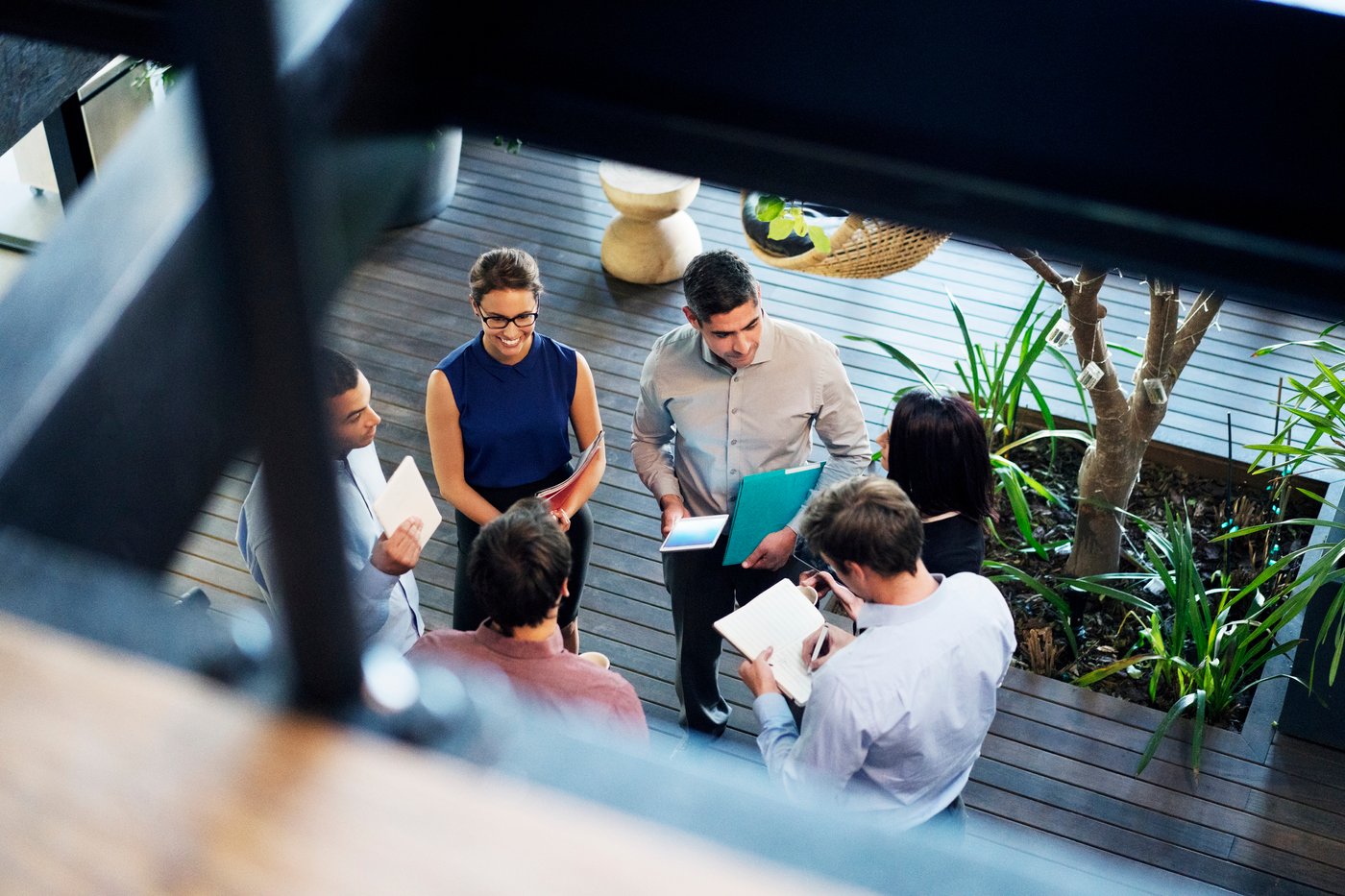 corporate office team talking about ESG goals for the year