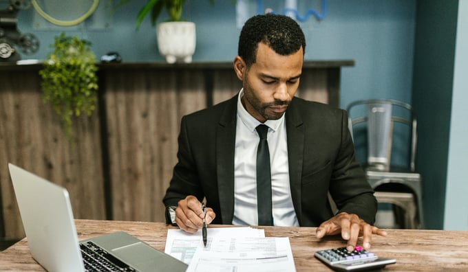 Financial adviser working at desk